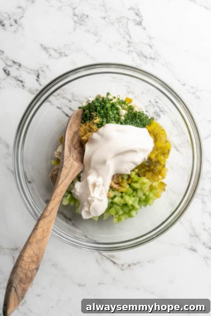Ingredients for vegan egg salad in mixing bowl