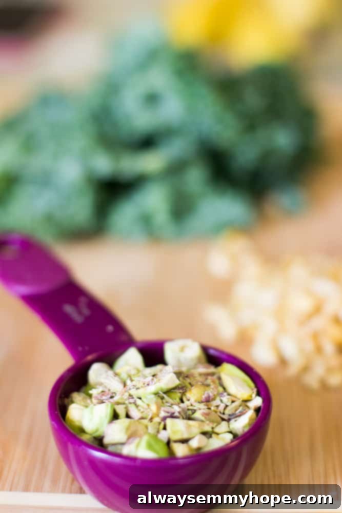 Pistachio nuts in a purple scoops.