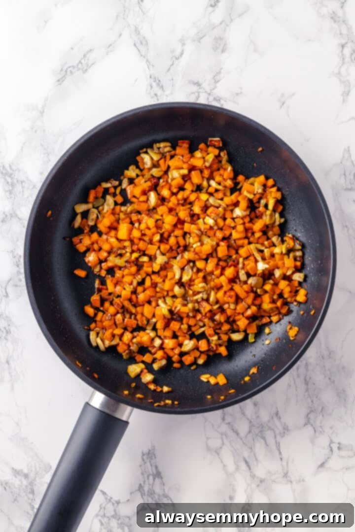 Vegan tourtière filling with carrots and mushrooms before adding lentils and meat