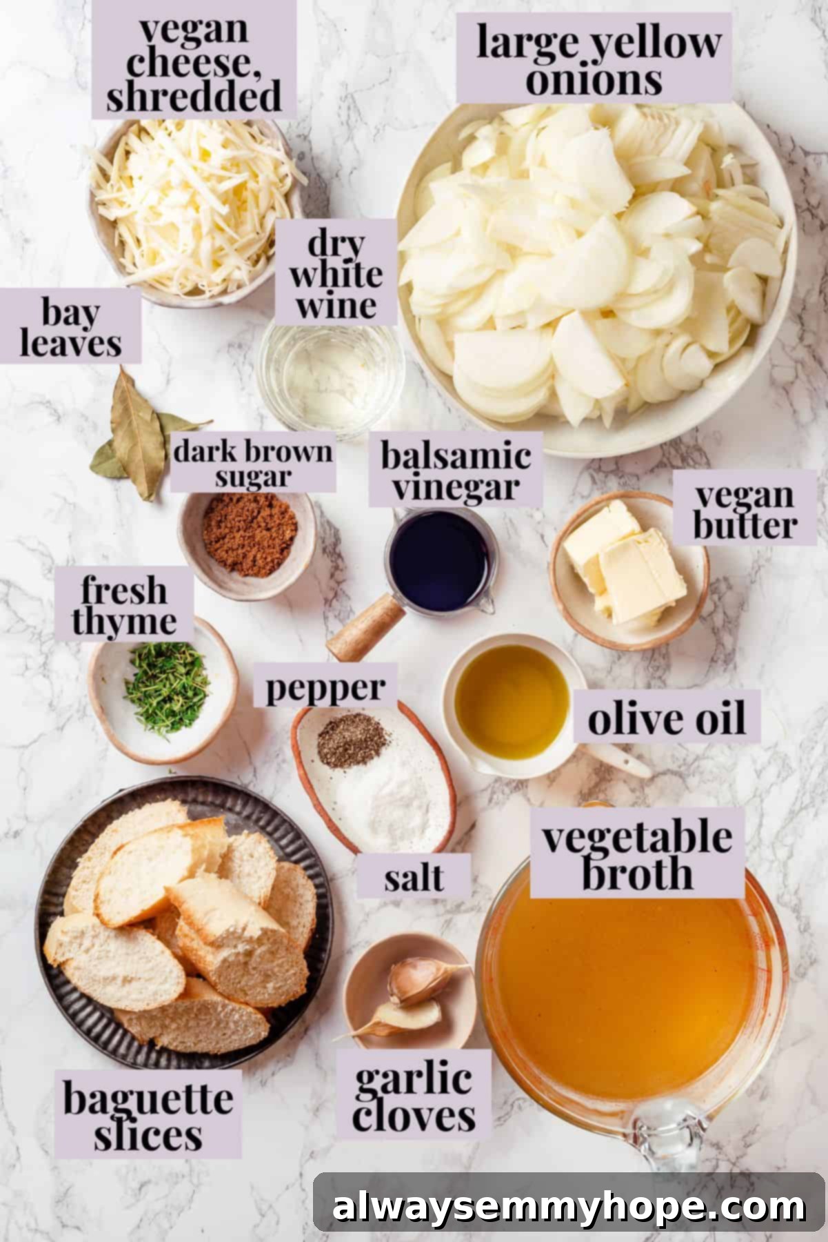 This vegan French onion soup recipe is full of rich, savoury flavour, and lots of melty cheese! The perfect cozy dinner for a chilly day. Overhead view of ingredients for French onion soup with labels