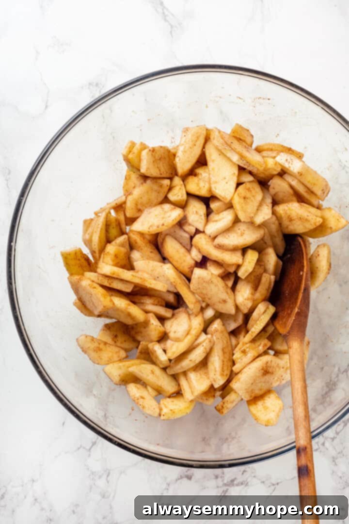 Overhead view of apple filling in mixing bowl