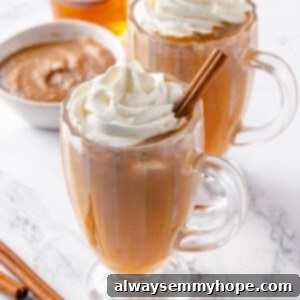 Fireside Buttered Rum 2 Two glass mugs of vegan hot buttered rum