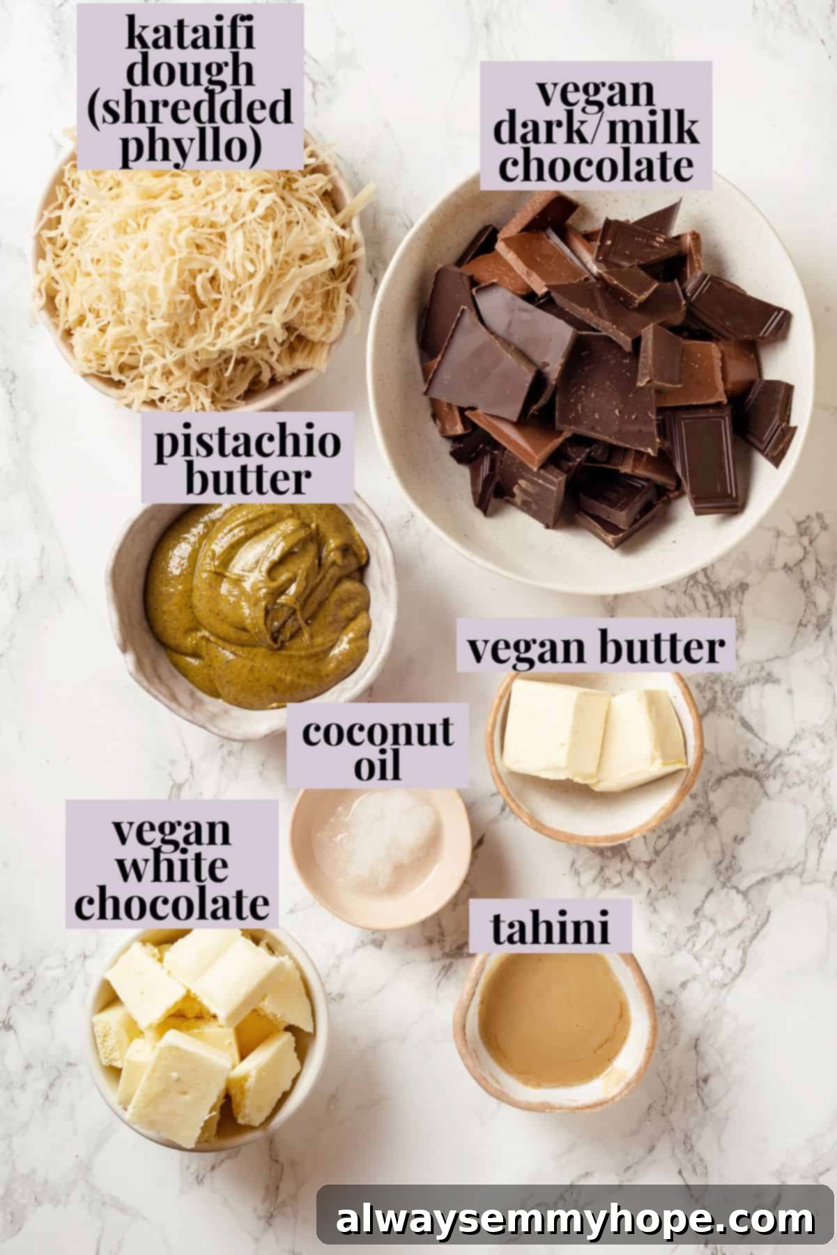 A Dubai chocolate bar is filled with crispy kataifi and a rich, creamy mixture of pistachio and tahini. Here’s how to make them at home! Overhead view of ingredients for Dubai chocolate bar recipe with labels