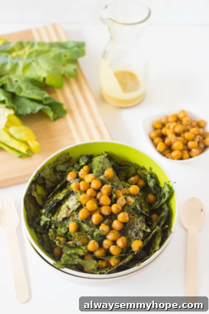 Vibrant Kale & Chickpea Salad with Zesty Lemon Poppyseed 2 Chickpea salad in a green bowl.