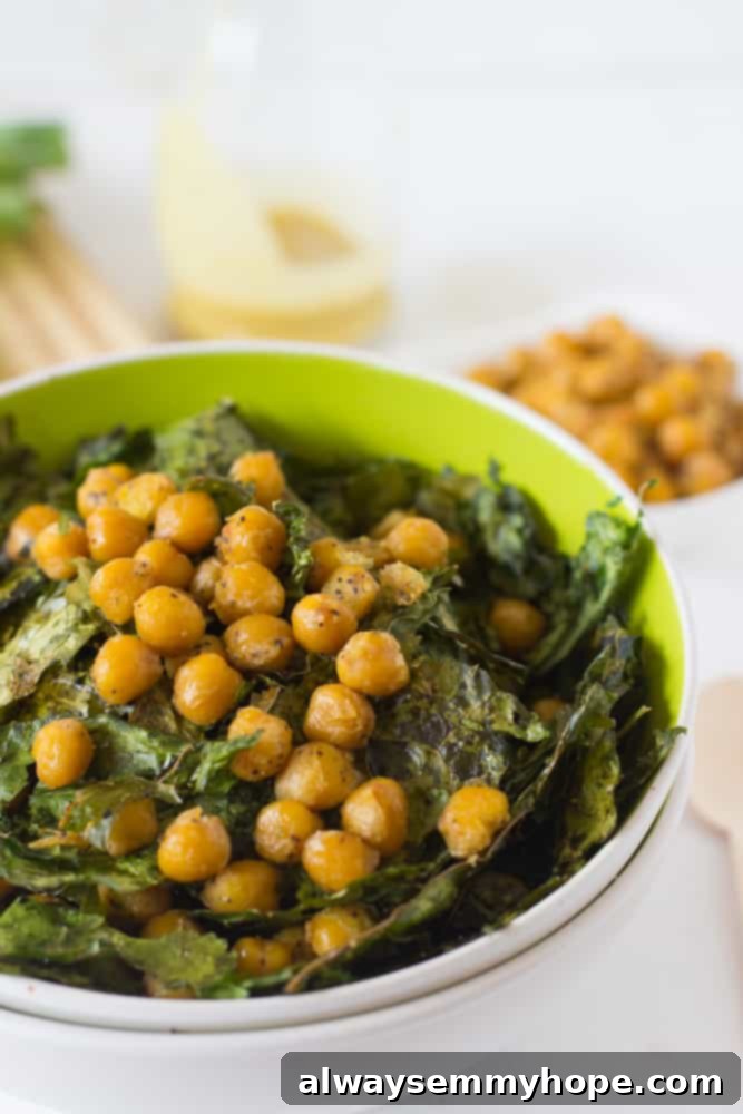 Vibrant Kale & Chickpea Salad with Zesty Lemon Poppyseed 6 Close up of crunchy kale & chickpea Salad in a green bowl.
