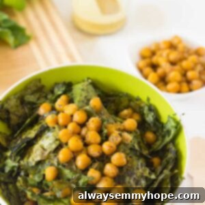 Vibrant Kale & Chickpea Salad with Zesty Lemon Poppyseed 7 Kale and chickpea salad in a green bowl.
