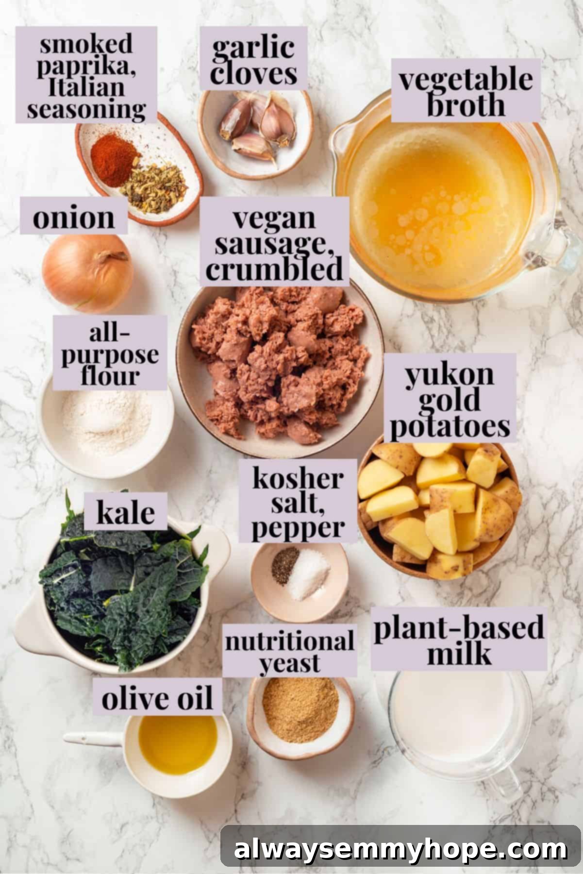 Zuppa toscana is creamy and hearty with tender potatoes and kale, and this vegan version is just as tasty as the Olive Garden original! Overhead view of ingredients for zuppa toscana with labels including olive oil, onion, garlic, vegan sausage, seasonings, flour, broth, potatoes, plant milk, nutritional yeast, and kale.