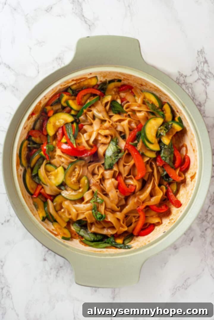 This easy Thai drunken noodles recipe is a quick stir-fry dinner perfect for a weeknight. They're sweet, savoury, spicy—and vegan too! Thai drunken noodles in skillet