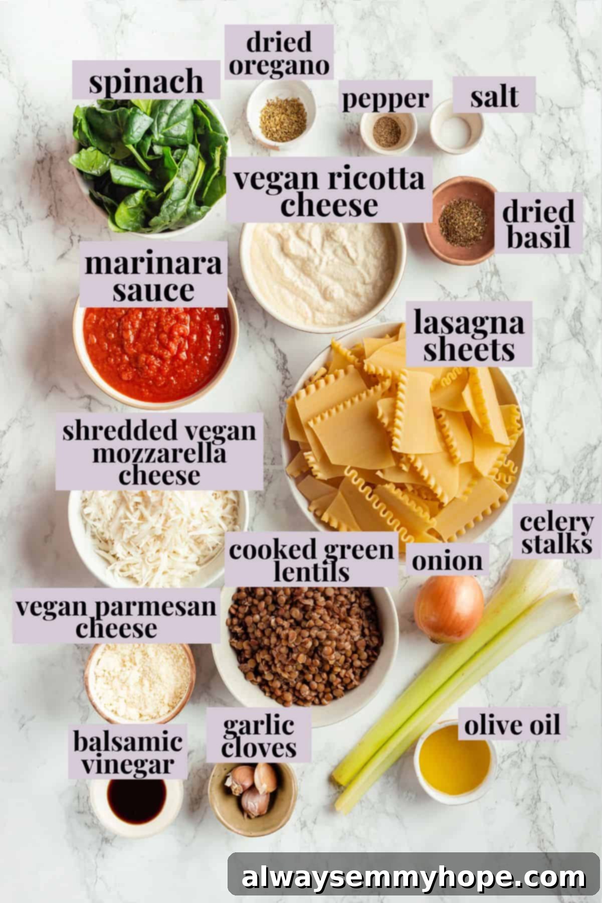 This vegan sheet pan lasagna recipe is a different way to enjoy all that cheesy pasta goodness—easier, quicker, and more crispy edges! Overhead view of ingredients for sheet pan lasagna with labels