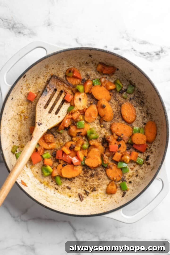 This brown stew tofu recipe is a flavourful, hearty dinner inspired by traditional Jamaican cooking—but with a vegan twist! Sautéing the reserved marinade mixture and fresh vegetables in a skillet