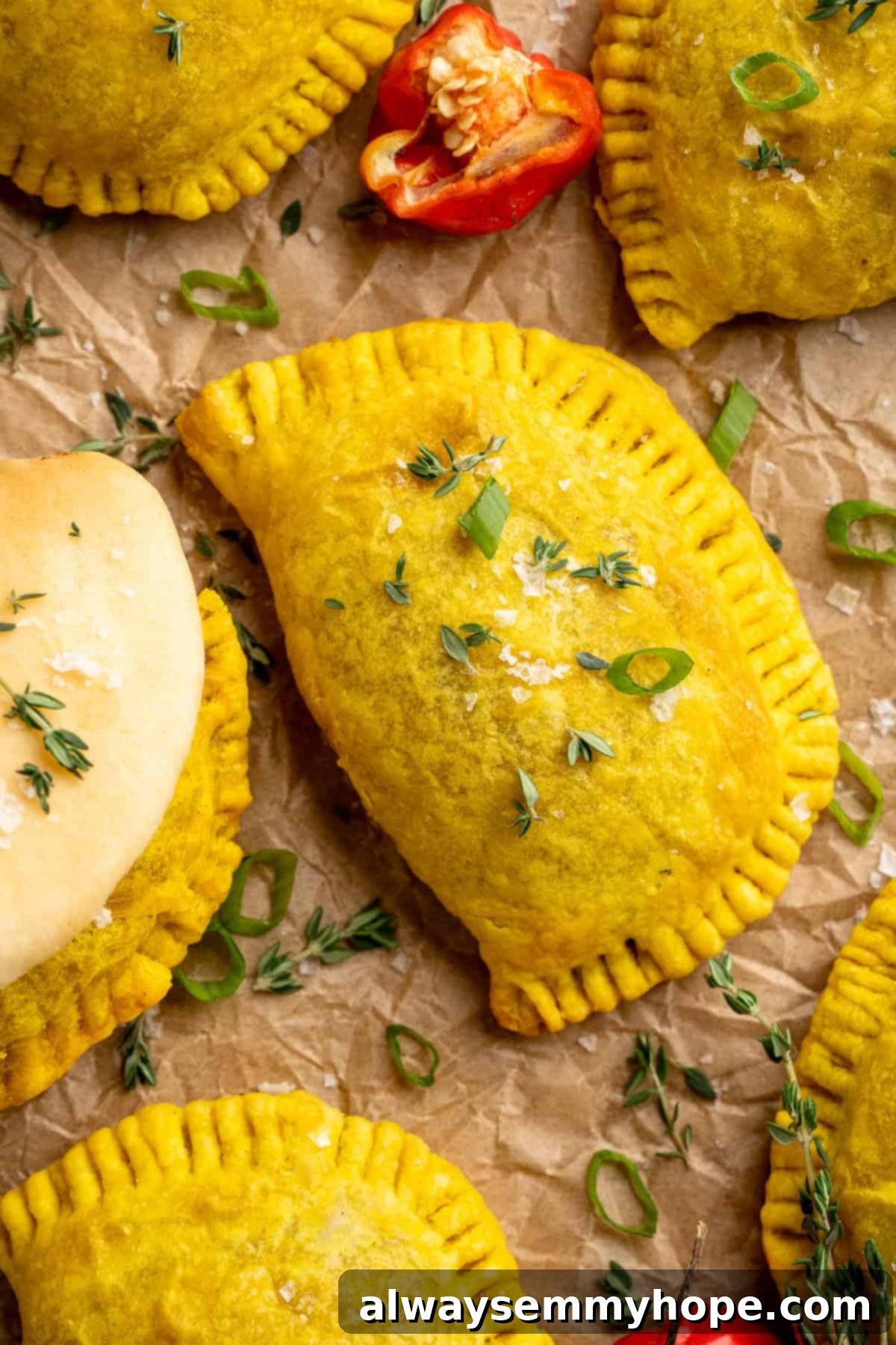 Overhead view of perfectly baked vegan Jamaican patties with a golden, flaky crust