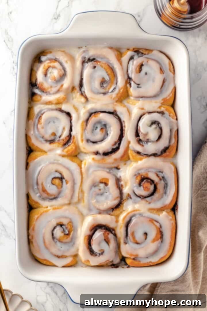 Overhead view of homemade honey buns in baking dish