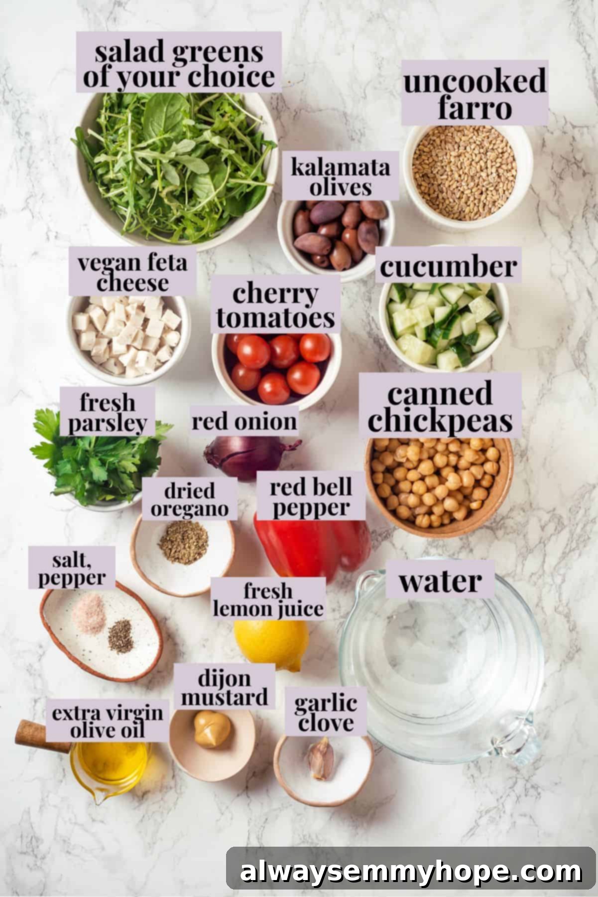 This farro salad is hearty and satisfying, with bright and bold Greek flavours to make it delicious. It might just be the perfect lunch! Overhead view of all fresh ingredients for Greek farro salad neatly arranged before preparation