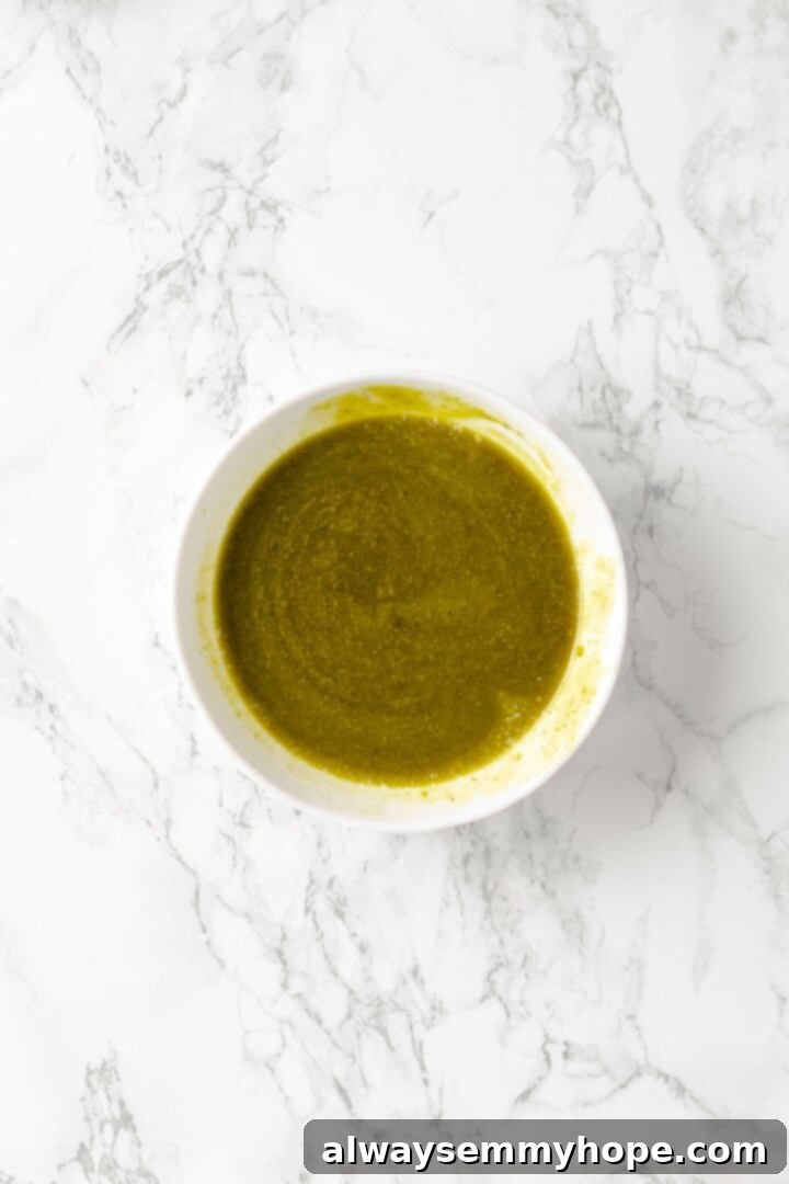 Pistachio butter and vegan butter mixed in small bowl