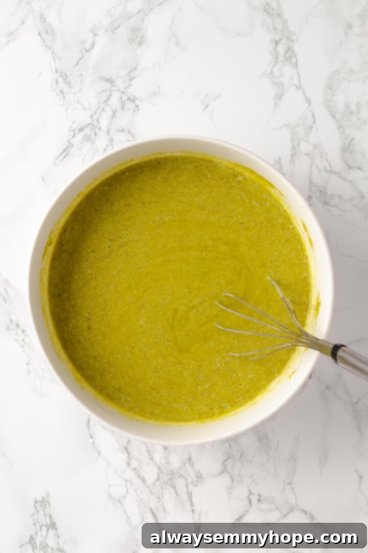 Overhead view of liquid ingredients for pistachio cake