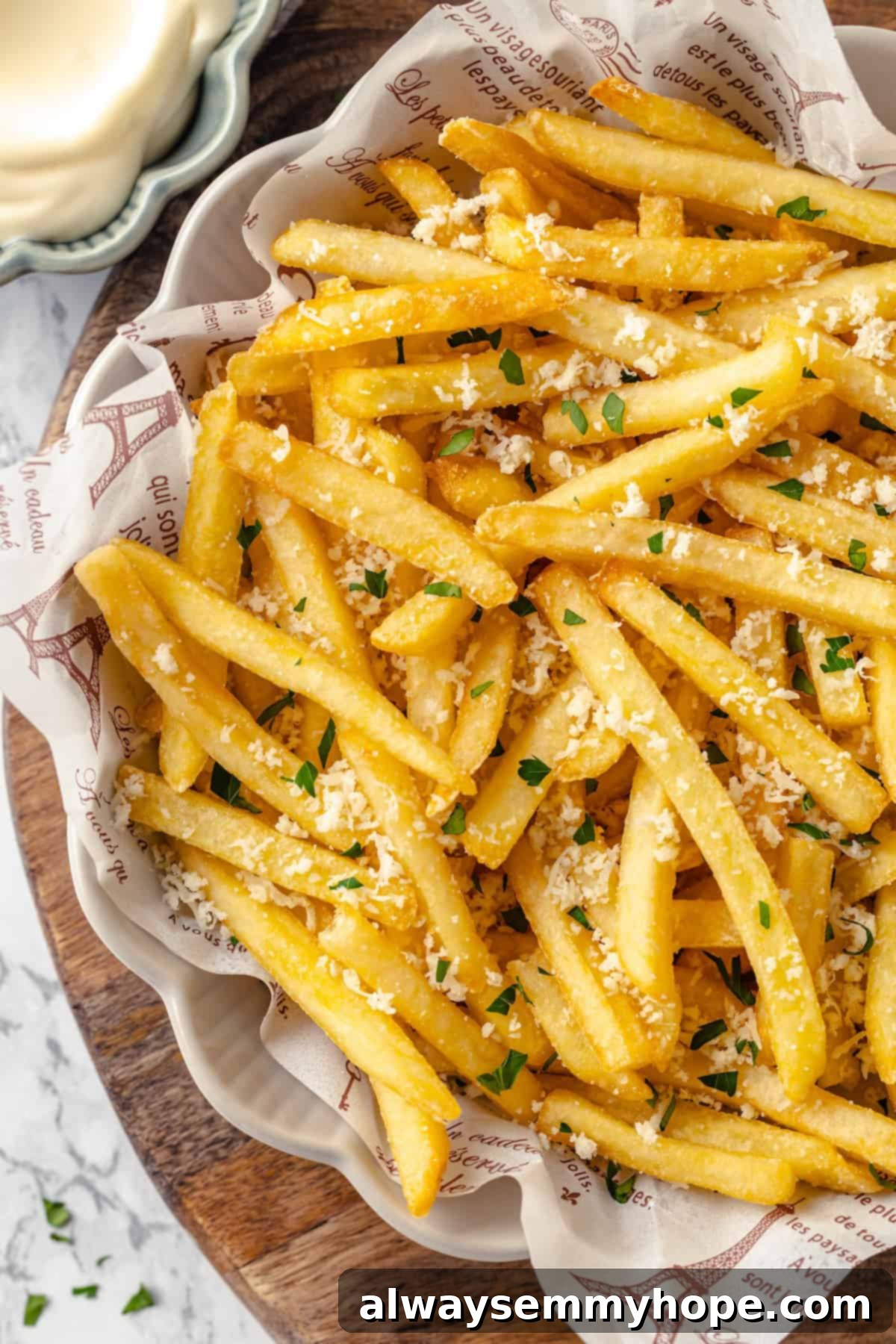 Overhead view of crispy vegan truffle fries in bowl