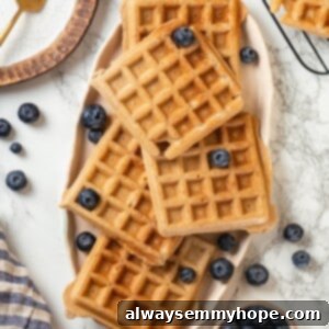 Overhead view of protein waffles on platter