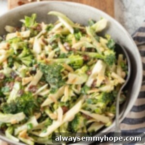 Best Broccoli Slaw 2 Vegan broccoli slaw in bowl with spoon