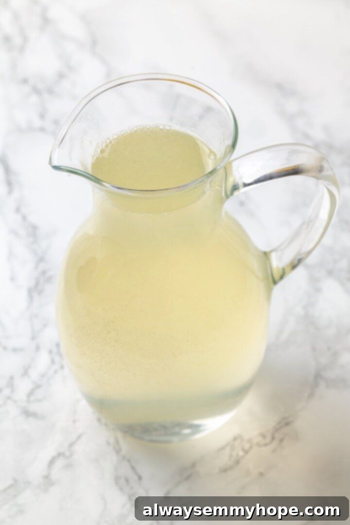 Pitcher of freshly mixed lavender lemonade