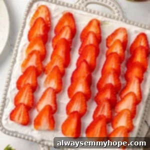 Effortless Strawberry Layered Delight 2 Overhead view of strawberry icebox cake in dish