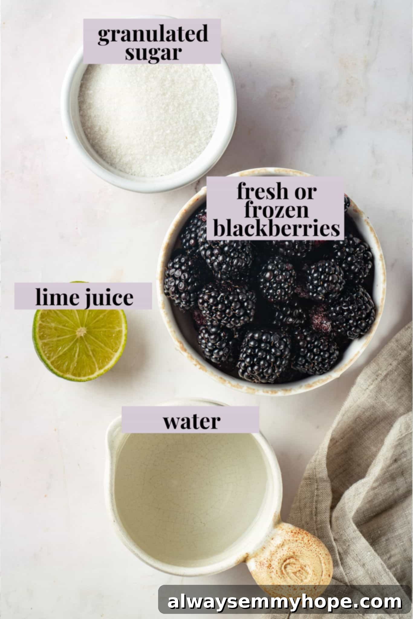 This summery blackberry margarita recipe is refreshing, delicious, and perfect for adding to your Taco Tuesday menu. It's always a hit! Overhead view of fresh blackberries, granulated sugar, and water in bowls, ready for making blackberry syrup.