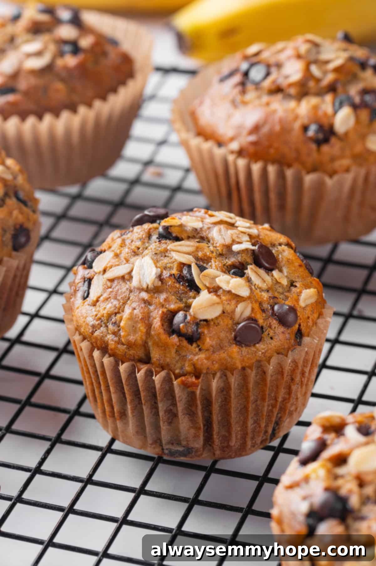 Closeup of banana oatmeal muffin on wire rack