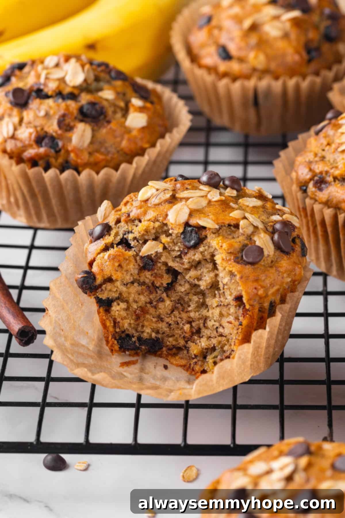 Banana oatmeal muffin with bite taken out