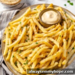 Homemade Garlic Fries (Baked or Fried) 2 Platter of vegan garlic fries with bowl of aioli