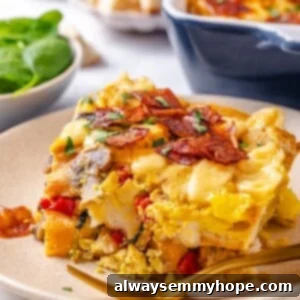Slice of vegan overnight breakfast strata on plate with fork