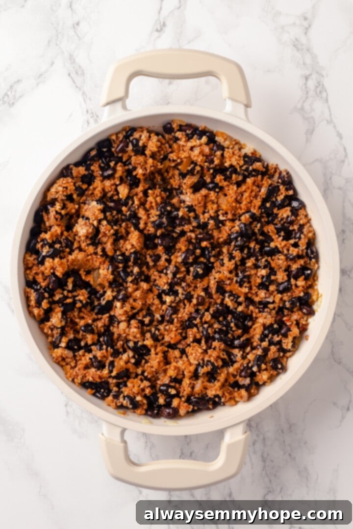 Walnut black bean meat in skillet.