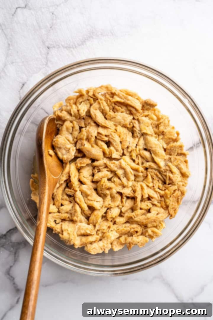 Soy curls hydrated in broth.