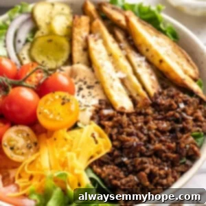 Vegan Cheeseburger Bowl Delight 2 Vegan cheeseburger bowl with fries.