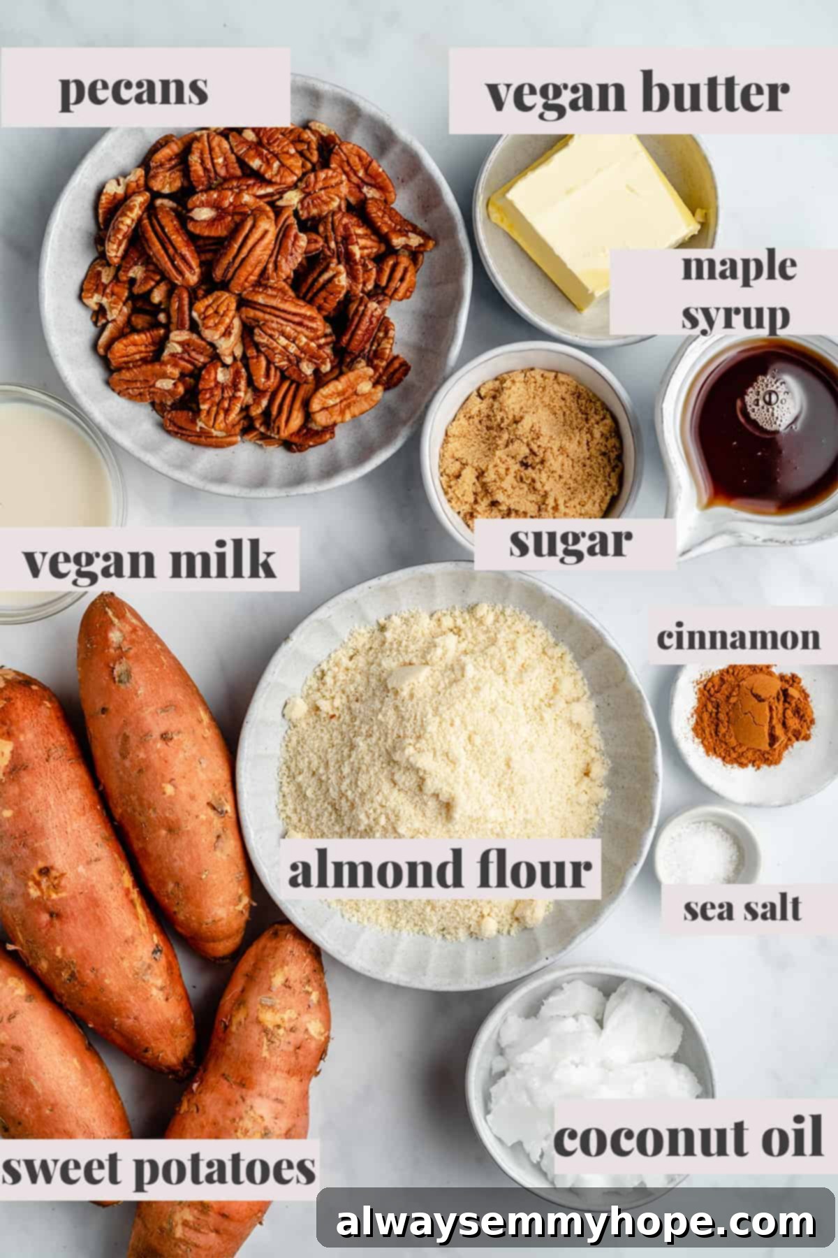 Maple Pecan Crunch Vegan Sweet Potato Bake 4 A display of fresh ingredients for vegan sweet potato casserole, including whole sweet potatoes, maple syrup, pecans, cinnamon sticks, and vegan butter, laid out on a rustic wooden board.