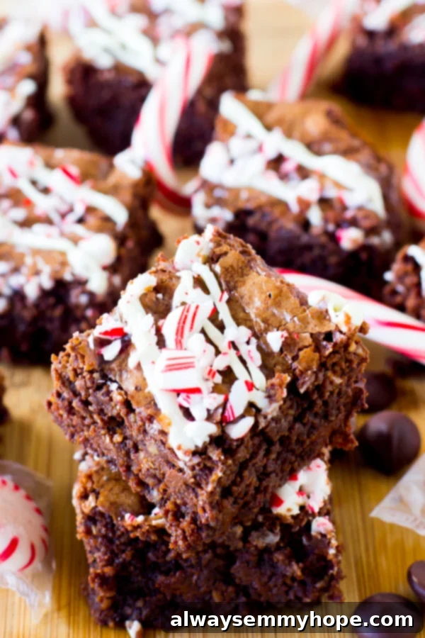 A batch of chocolate brownies on a wooden table. 