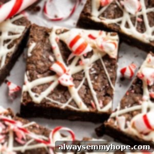 Peppermint brownies topped with white chocolate and candy canes.