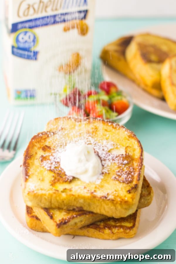 Eggnog French Toast 4 Sprinkling confectioner's sugar on french toast.