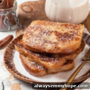 Eggnog French Toast 6 Stack of 3 slices of eggnog French toast on plate.