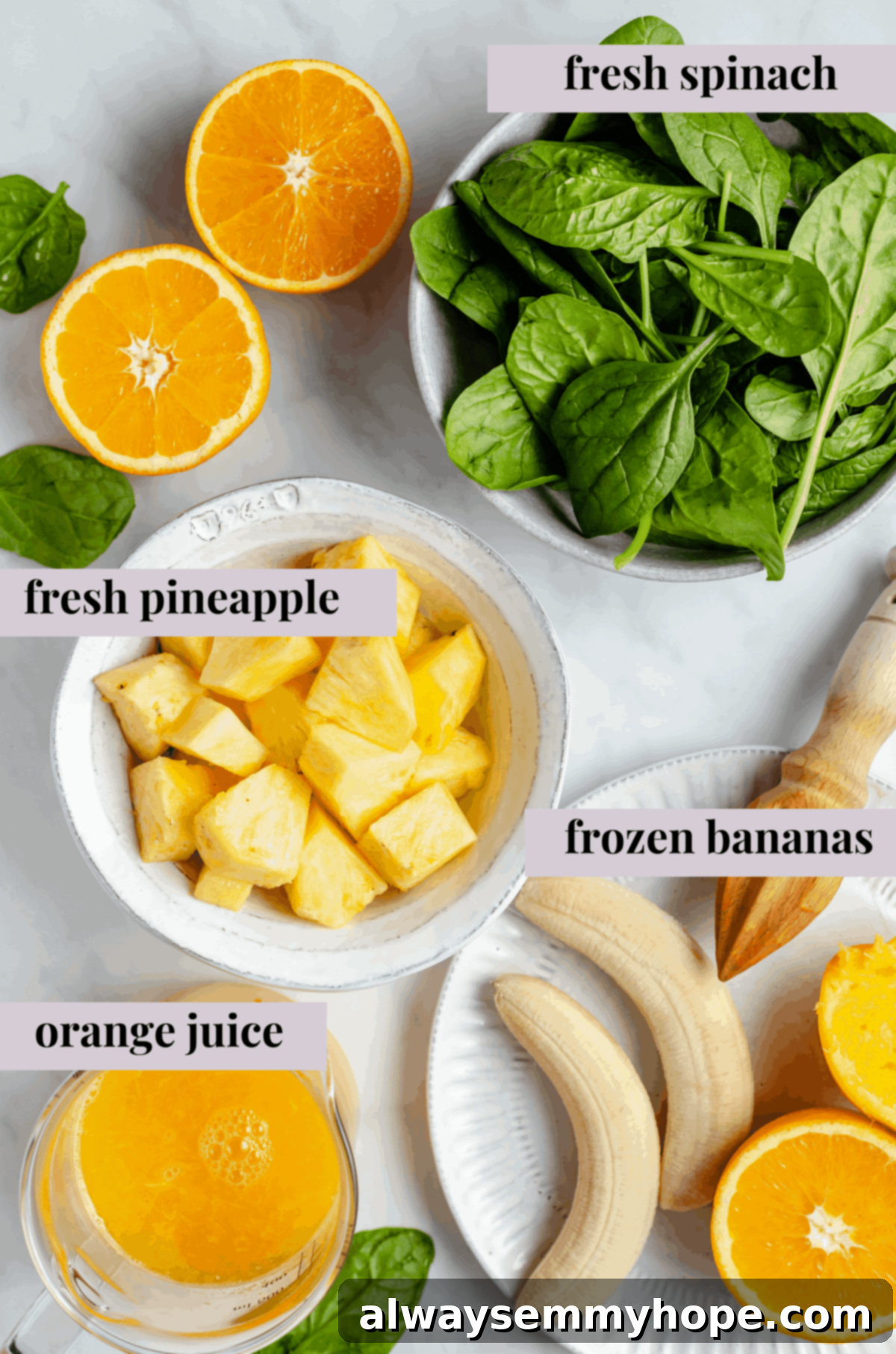 This vegan green smoothie only has four ingredients and is one of my favourite quick, easy breakfasts. It's smooth and creamy without dairy! Fresh ingredients for a vegan green smoothie laid out with text labels: pineapple, spinach, bananas, orange juice.
