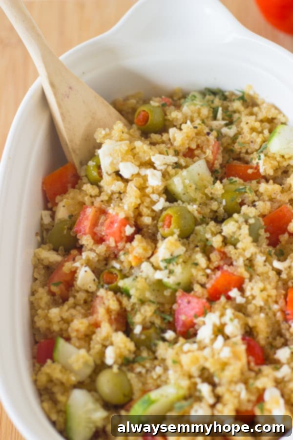Mediterranean Quinoa Salad in a serving bowl, ready to eat, showing the vibrant colors