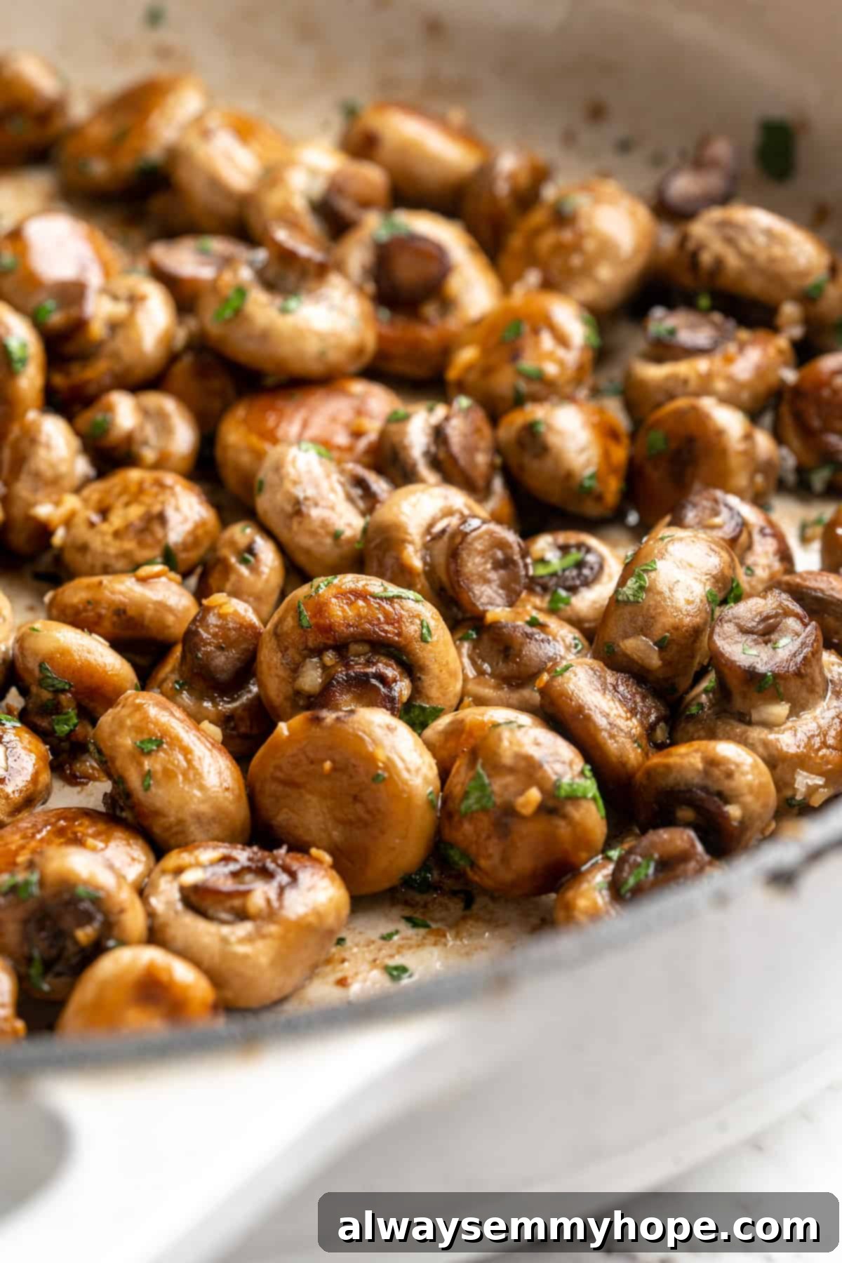 Garlic mushrooms in skillet
