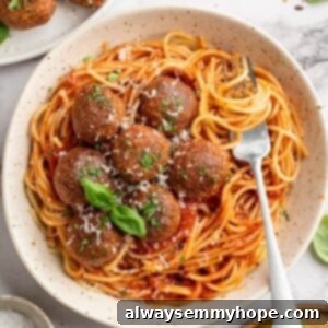 Plant-Based Meatballs 2 Overhead view of chickpea and beet vegetarian meatballs in bowl of spaghetti