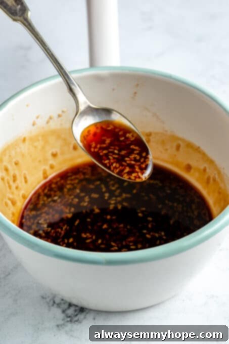 Spoonful of teriyaki sauce.