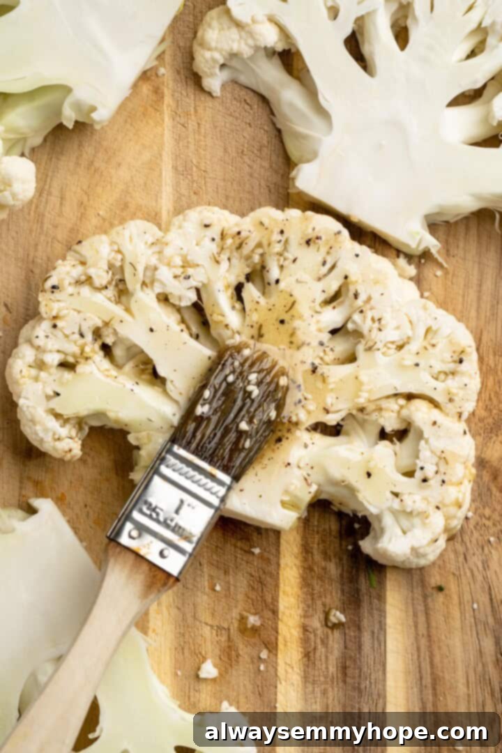 These easy roasted cauliflower steaks are tender, crispy on the edges, and incredibly flavourful thanks to the addition of za’atar! Brushing seasoning mixture onto cauliflower steaks