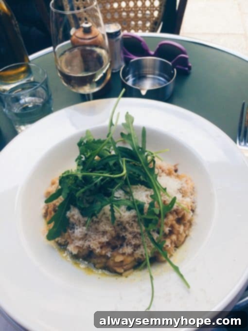 Unlocking Parisian Flavors 9 A white dish with arugula on a restaurant table.