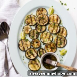 Overhead view of lemon garlic grilled zucchini on platter