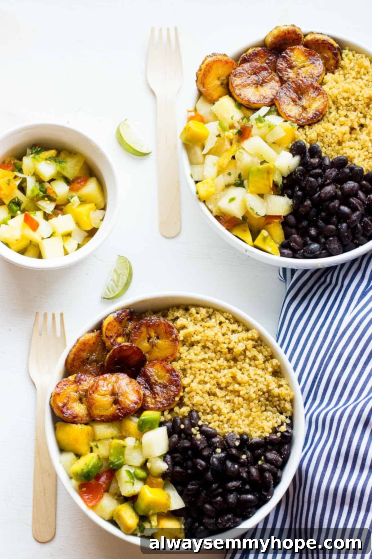 Cuban Quinoa & Pineapple Salsa Bowls 3 Overhead shot of cuban quinoa bowls with forks on the side.