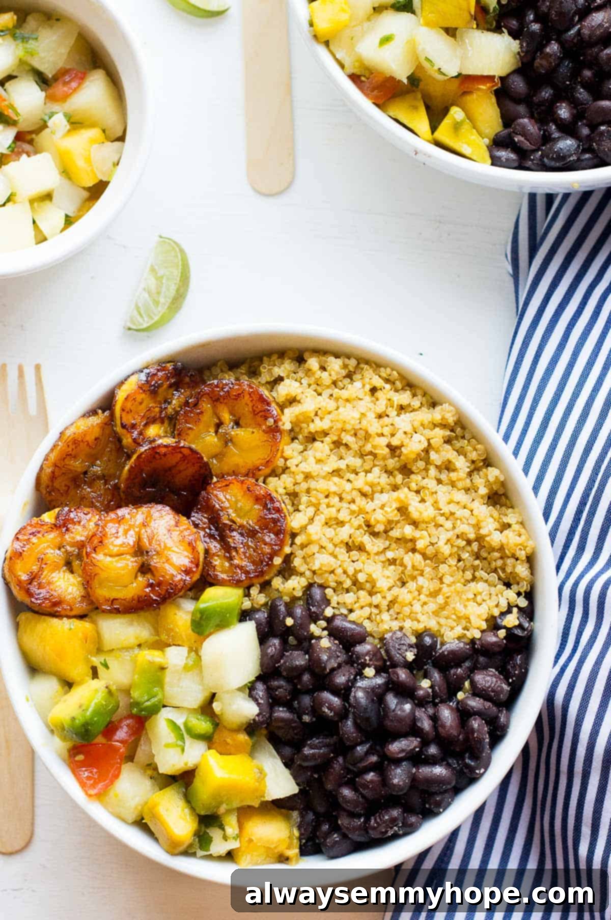 Cuban Quinoa & Pineapple Salsa Bowls 4 Top down shot of a quinoa bowl on a white table.