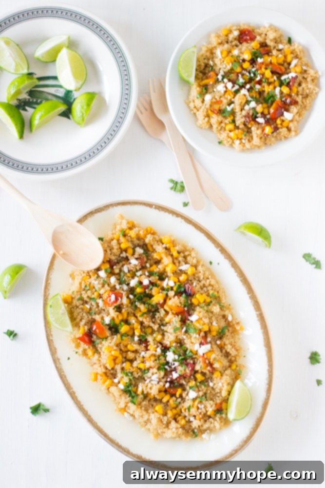 Quinoa and corn salad on a long white dish, highlighting fresh kernels.