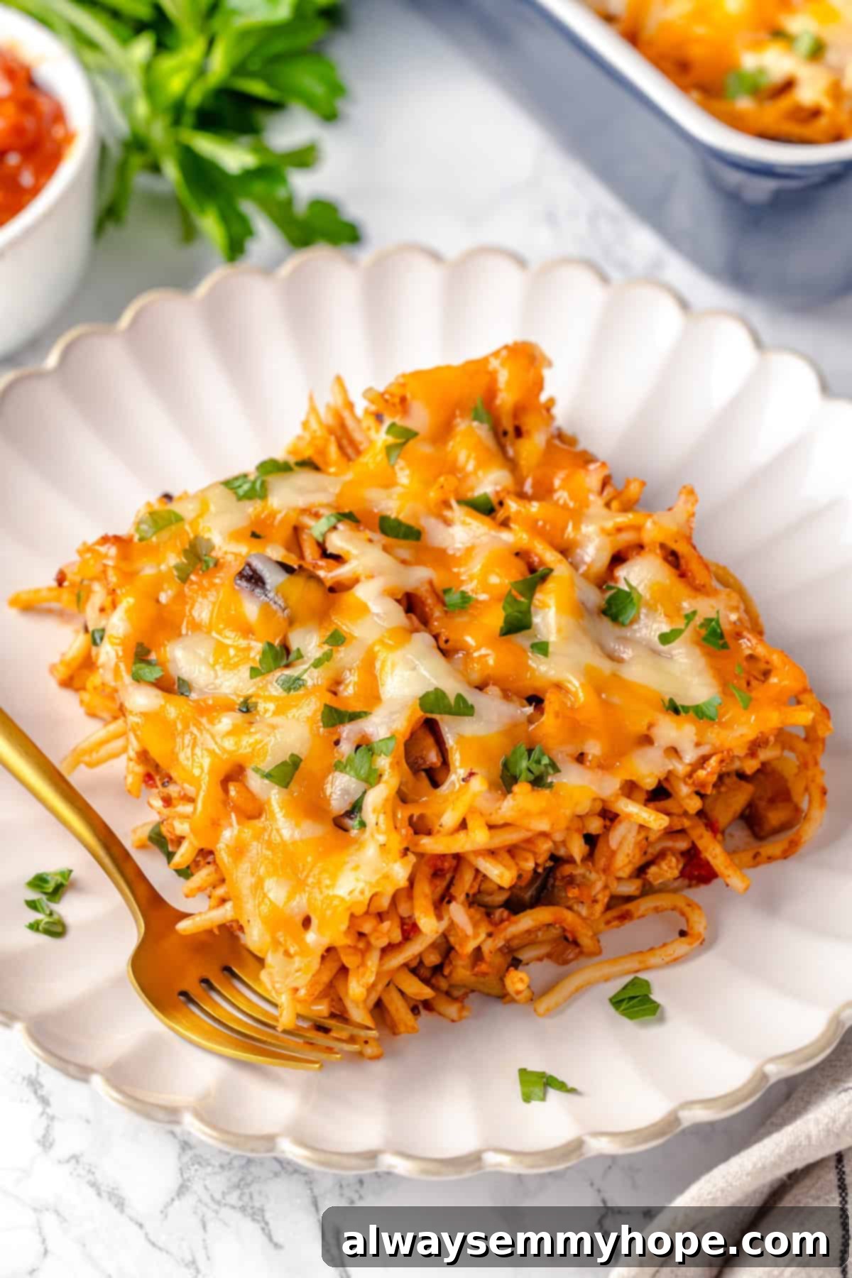 Plate of baked spaghetti with fork