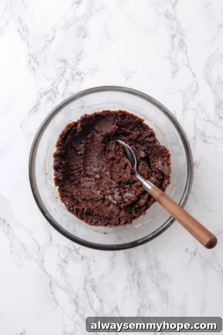 Cinnamon swirl mixture in bowl with spoon
